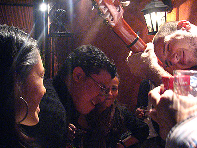 Marylin and Naíto look on as Hector sings a fandango for the Malaguena.